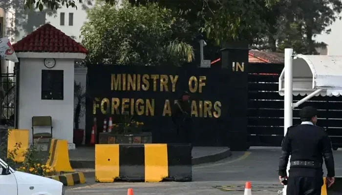 A police officer stands guard outside the Ministry of Foreign Affairs in Islamabad on January 18, 2024. — AFP/File