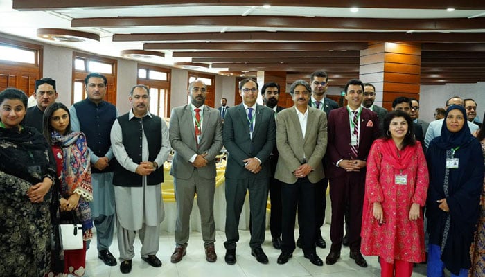 Sindh Assembly Speaker Syed Awais Qadir Shah, in a group photo with a delegation of senior officers participating in the 46th Mid-Career Management Course (MCMC) on May 20, 2026. — Facebook@pasgovofficial