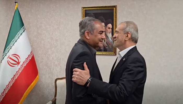 Iranian President Masoud Pezeshkian greets Pakistan’s Interior Minister Mohsin Naqvi upon arrival in Tehran, May 20, 2026. —Screengrab via Facebook@realmohsinnaqvi