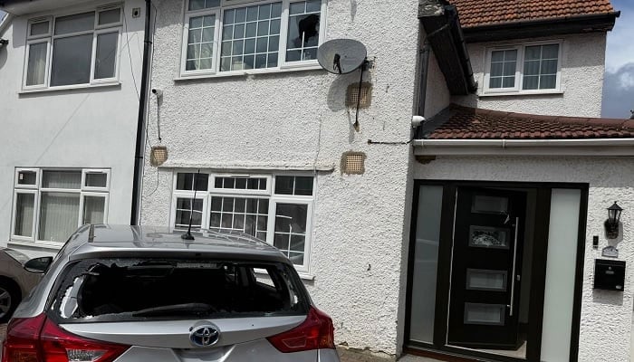 The picture shows damage to the property and a vehicle belonging to British-Pakistani Conservative politician, Tariq Aziz, following attacks in Hounslow, West London. — Reporter