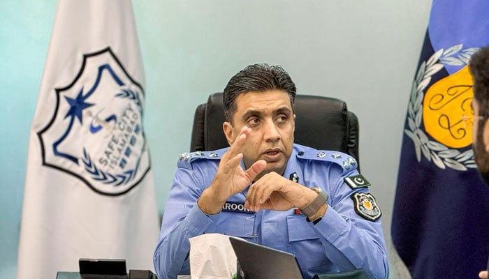 DG Safe City/ DIG Traffic Muhammad Haroon Joya can be seen in a meeting. — APP/File