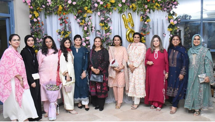 A group photo of participants of the FG Institute of Home Economics with Principal Prof Rozina Faheem in the Alumni Association ceremony on May 21, 2026. — INP