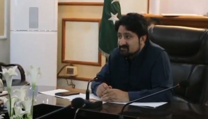 Deputy Commissioner of Charsadda, Dr Azmatullah Wazir, is seen during a meeting. — Screengrab via X@DCCharsadda