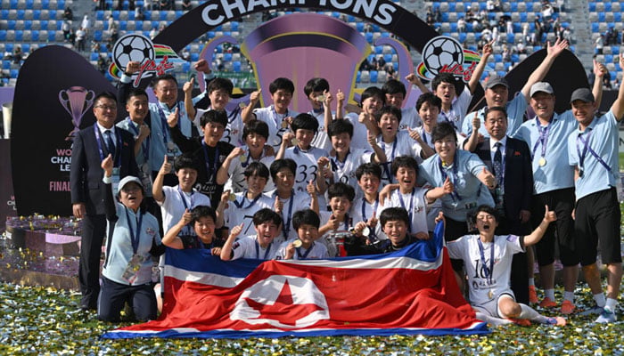 Naegohyang Womens FC team posing for a photo after they beat Japans Tokyo Verdy Beleza to win the Asian Womens Champions League. —AFP