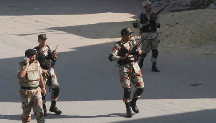 The Sindh Rangers personnel patrolling a street in Karachi. — The News/File