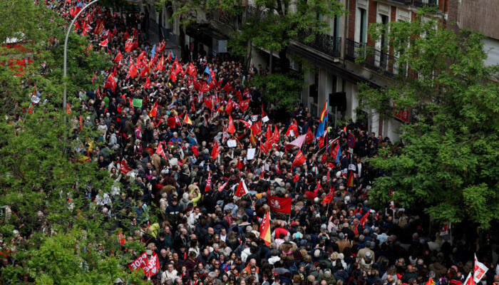 People gather outside Spains Socialist Party (PSOE) headquarters to show support for the Secretary General of PSOE and Prime Minister Pedro Sanchez, in Madrid, Spain April 27, 2024. —Reuters