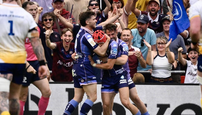 Louis Bielle-Biarrey (centre) celebrating scoring against Leinster. —AFP/File