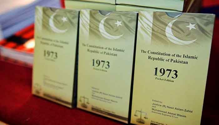 A representational image shows the copies of the Constitution of the Islamic Republic of Pakistan, 1973. —TheNews/File