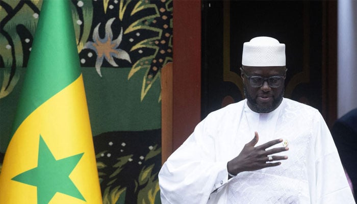 President of the Senegalese National Assembly, Malick Ndiaye, arrives to attend a plenary session on current affairs at the National Assembly in Dakar on February 21, 2025. — AFP