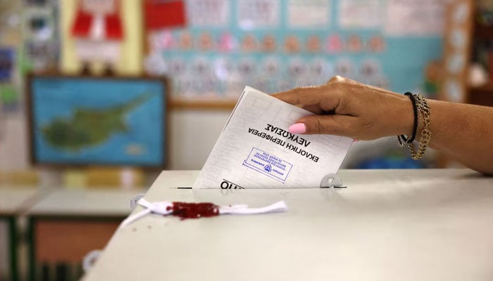 A woman casts her vote during parliamentary elections at a polling station in Nicosia, Cyprus May 24, 2026.—Reuters
