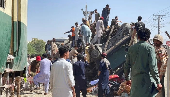 People gather as they search for survivors after a blast near a railway track in Quetta, May 24, 2026. — Reuters
