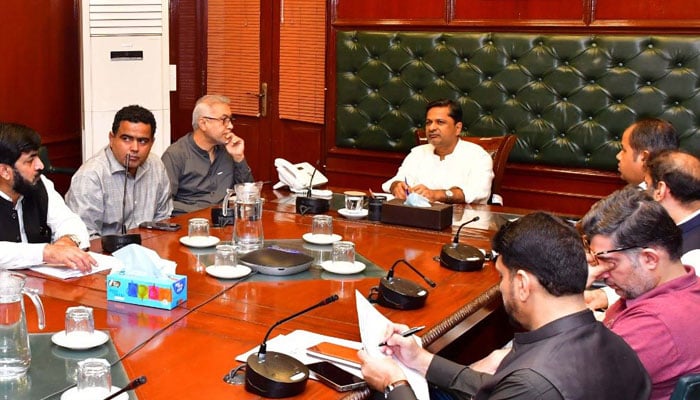 Karachi Commissioner Syed Hassan Naqvi chairs a meeting on May 24, 2026. — Facebook@Commissioner Karachi Office