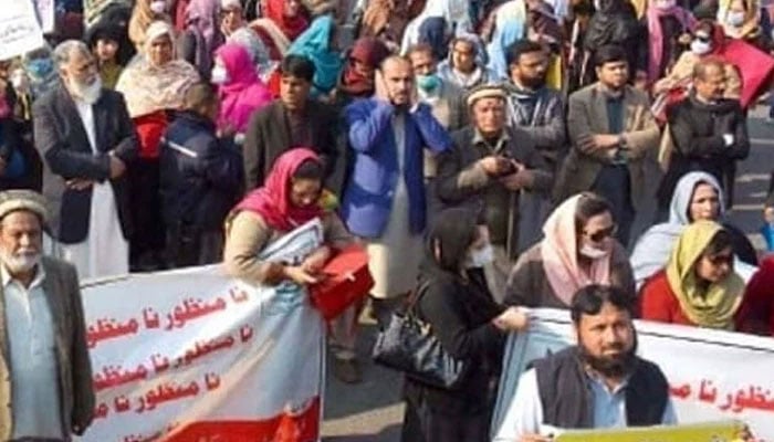 Representational image of teachers holding a protest with placards and banners. — INP/File