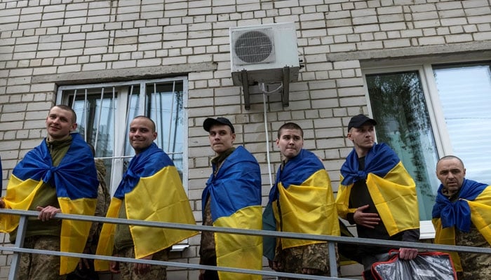 Former Ukrainian prisoners of war (POW) arrive after a prisoner swap with Russia in an undisclosed location in Ukraine, May 6,2026. — Reuters