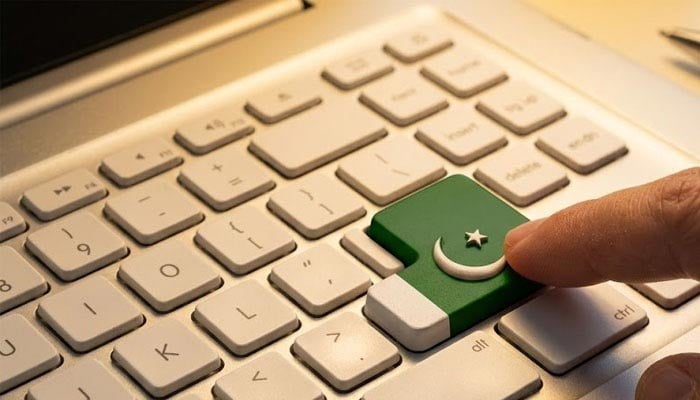 A representational image of a sticker of the Pakistani flag on a keyboard. — AI generated