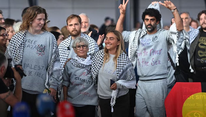 Australian members of the Gaza-bound Global Sumud Flotilla, which was intercepted by Israeli forces, arrive at Sydney International Airport, Sydney, Australia, May 25, 2026. — Reuters