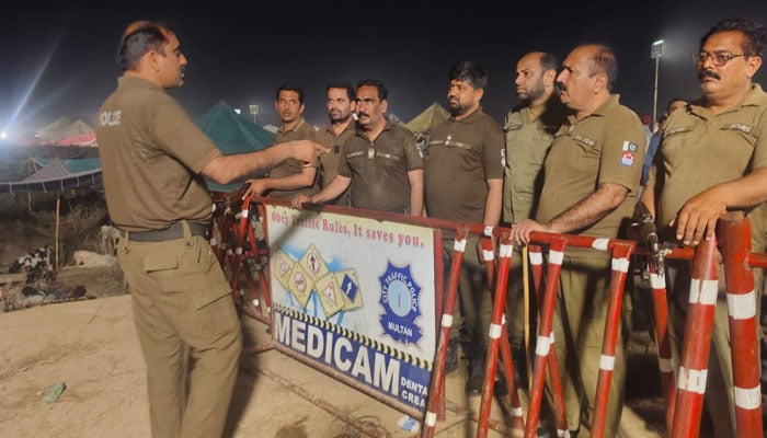 Punjab Police officials are standing alert on the road in the city on May 25, 2026. — Facebook@cpomultanofficialpage