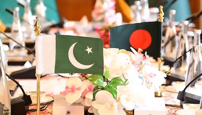 Pakistan and Bangladesh flags on a table during a meeting between Deputy Prime Minister and Foreign Minister Senator Mohammad Ishaq Dar and Foreign Adviser of Bangladesh Md Touhid Hossain in Dhaka on August 24, 2024. Screengrab via X/@ForeignOfficePk