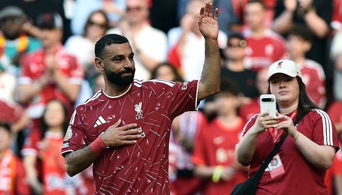 Liverpools Mohamed Salah salutes the fans after playing his last match for the club
