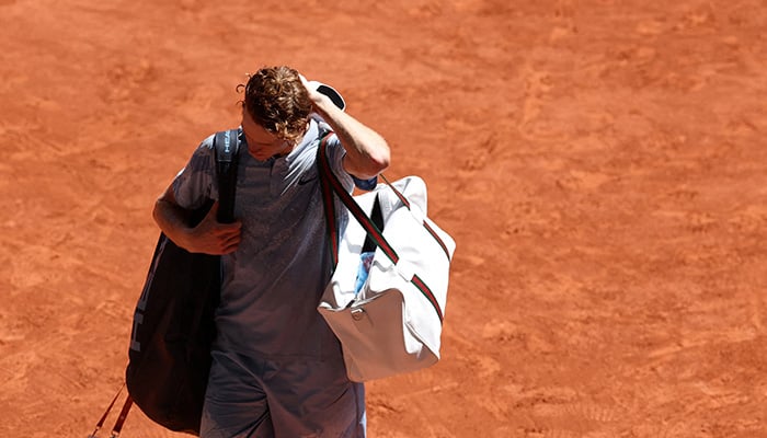 Italys Jannik Sinner leaves the court after losing his second round match against Argentinas Juan Manuel Cerundolo. — Reuters/File