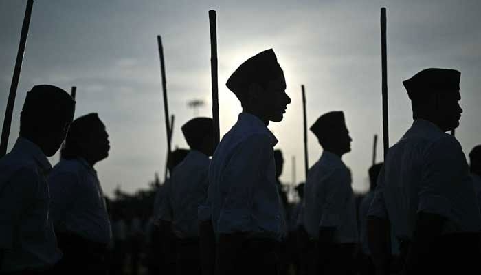 Rashtriya Swayamsevak Sangh (RSS) volunteers wait to take part in the Hindu nationalist organisation´s centenary celebrations at Reshimbagh Ground in Nagpur on October 2, 2025. — AFP