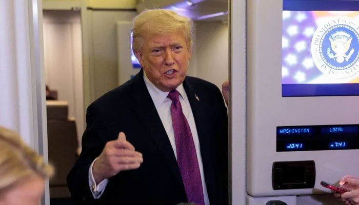 US President Donald Trump talks to members of the media aboard Air Force One en route to Joint Base Andrews, Maryland, US, April 17, 2026. — Reuters