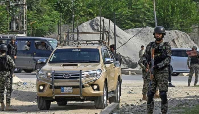 Security personnel stand guard in this undated image. — AFP/File