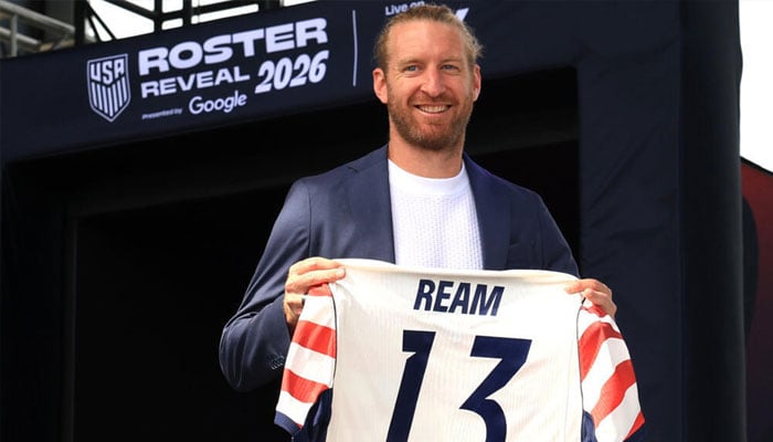 USA defender Tim Ream posing for the photo with his shirt. —AFP/File