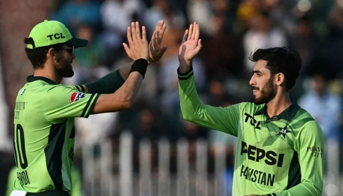 Pakistans Arafat Minhas (right) celebrates a wicket with captain Shaheen Afridi during the first ODI against Australia series in Rawalpindi, May 30, 2026. — PCB