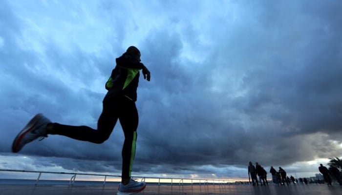A man jogs on the Promenade des Anglais in Nice, France, November 8, 2017. — Reuters