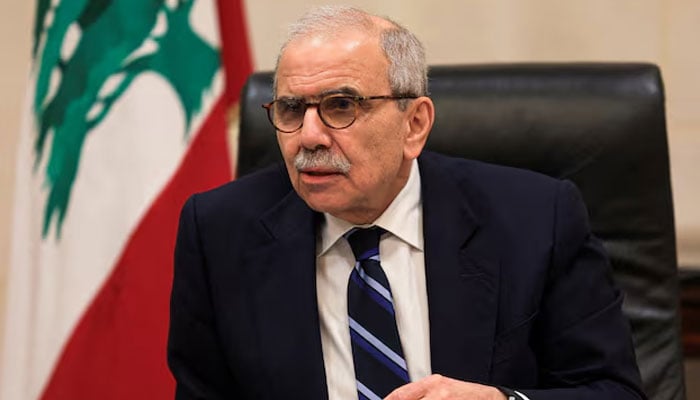 Lebanese Prime Minister Nawaf Salam speaks to journalists at the government headquarters in Beirut, Lebanon, December 3, 2025.—Reuters