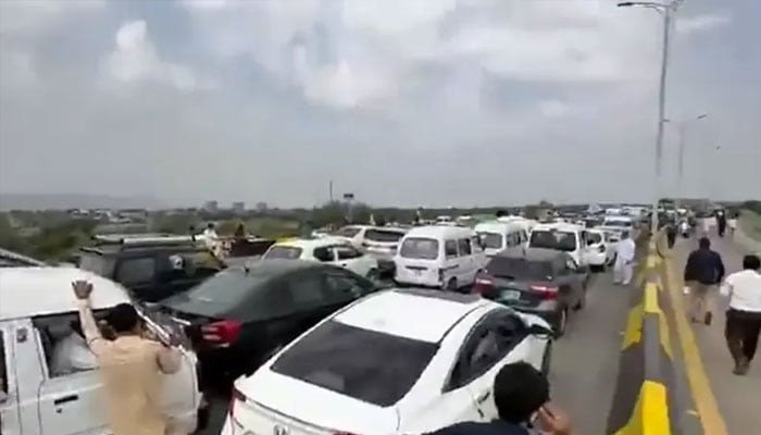 Vehicles are queued before the entry gate to the Islamabad airport on May 30, 2026. — screengrab via X/AsadQaiserPTI