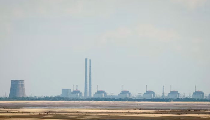 A view shows Zaporizhzhia Nuclear Power Plant from the bank of Kakhovka Reservoir near the town of Nikopol after the Nova Kakhovka dam breached, amid Russias attack on Ukraine, in Dnipropetrovsk region, Ukraine June 16, 2023.—Reuters