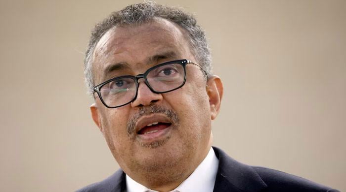WHO chief urges safe burials in visit to heart of Ebola outbreak