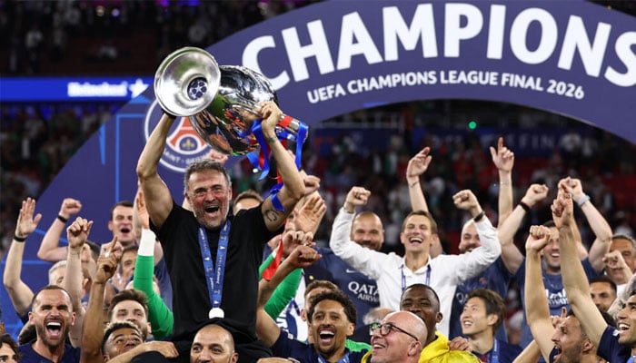 Luis Enrique lifted the Champions League trophy for a third time in his career and helped PSG retain it for a second consecutive season. —AFP