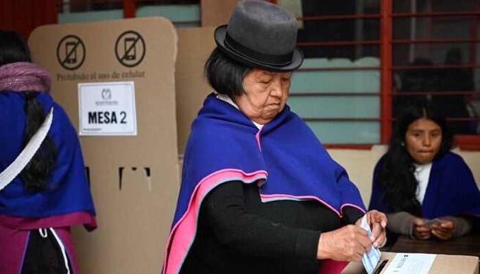 A Misak Indigenous woman casts her vote during the presidential election at the Guambia Indigenous Reserve in the Cauca department, Colombia, May 31, 2026. —AFP