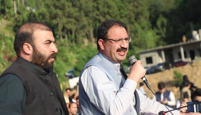 Pakistan Tehreek-e-Insaf (PTI) provincial president Junaid Akbar Khan addresses a rally on May 6, 2026. — Facebook@JunaidAkbarMNA