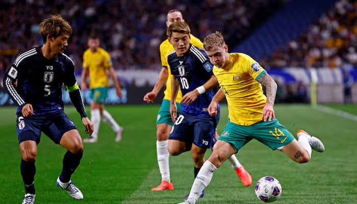Australias Riley McGree in action with Japans Ritsu Doan and Japans Hidemasa Morita. —Reuters/File