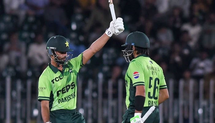 Pakistans Ghazi Ghori (left) celebrates scoring half-century with teammate Babar Azam during their first ODI against Australia at the Rawalpindi Cricket Stadium in Rawalpindi on May 30, 2026. — PCB