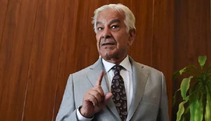 Defence Minister Khawaja Muhammad Asif gestures on the day of an interview with Reuters in Islamabad. — Reuters/File