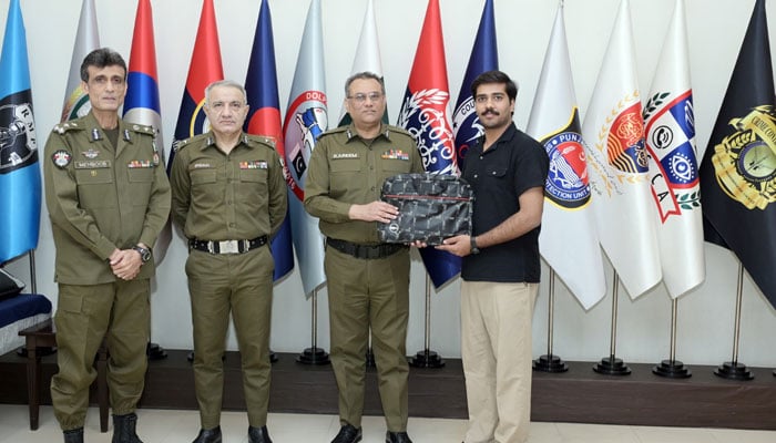 Inspector General of Police (IGP), Punjab, Abdul Kareem, distributes laptops among the children of police martyrs at the Central Police Office on June 1, 2026. — Facebook@punjabpolicecpo