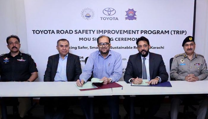 Indus Motor Company (IMC), NED University of Engineering and Technology, and Karachi Traffic police officials posing for a photo after signing an agreement, June, 3 2026. —Screengrab via Facebook@toyotapakistanofficial