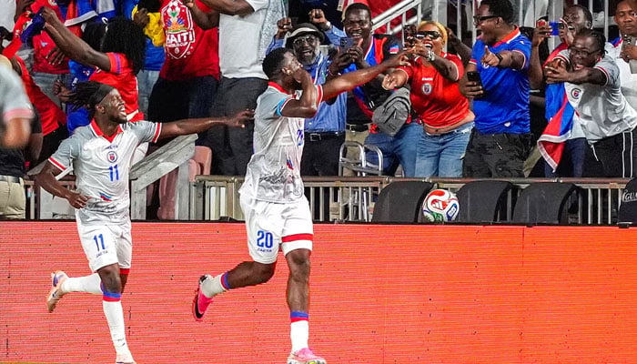 Haiti forward Frantzdy Pierrot (20) celebrates his goal against New Zealand during the second half at Chase Stadium.—Reuters