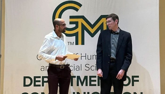 Pakistani academic, Syed Muhammad Abubakar (left), during the award ceremony at George Mason University (GMU), US, on May 14, 2026. — X@SyedMAbubakar