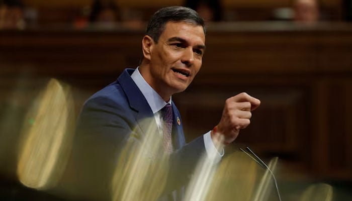 Spanish Prime Minister Pedro Sanchez reacts as he addresses lawmakers about the government action during the floods in eastern Spain, at Parliament in Madrid, Spain, November 27, 2024.—Reuters