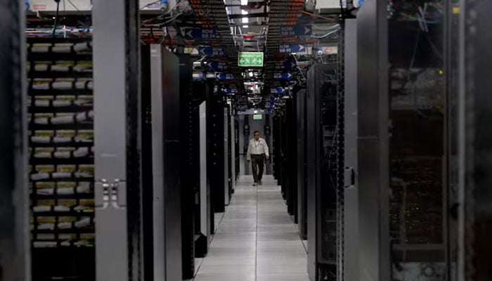 An employee walks through a data centre of Hewlett Packard Enterprise (HPE) inside its office building in Bengaluru, India, May 29, 2026.—Reuters