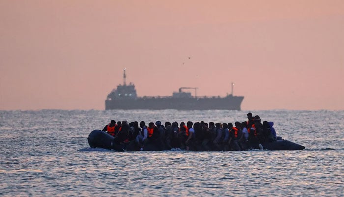 A group of migrants on an inflatable dinghy leave the coast of northern France in an attempt to cross the English Channel, July 17, 2025. —Reuters