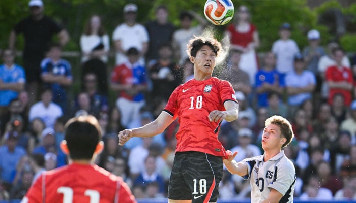 South Korea centre-back Lee Han-beom heads the ball during the 1-0 win over El Salvador. —AFP