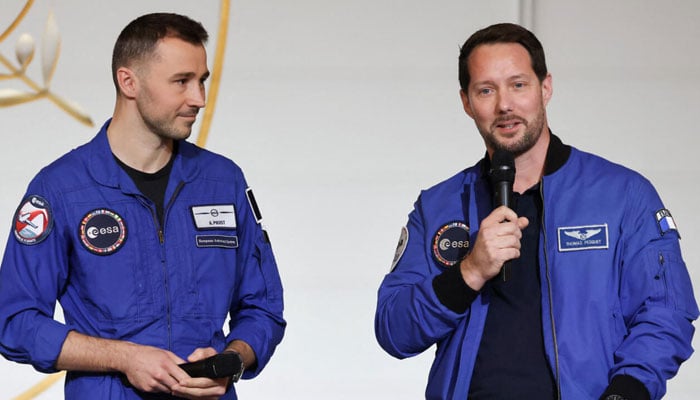 French astronauts Thomas Pesquet and Arnaud Prost address an audience at the presidential Élysée Palace in Paris on February 5, 2026.—AFP