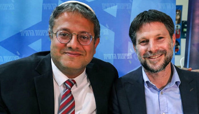 Israels (L to R) Foreign Minister Gideon Saar and Finance Minister Bezalel Smotrich attend the address of Argentinas President to a session of the Israeli parliament (Knesset) at its headquarters in Jerusalem on June 11, 2025. — AFP